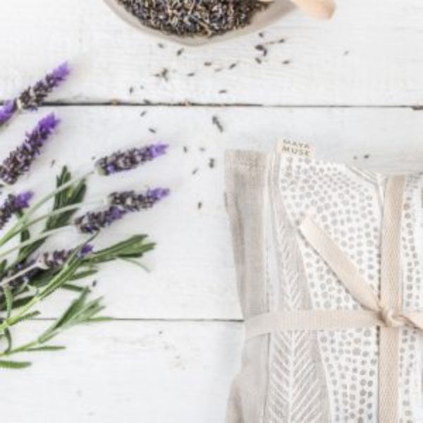 Maya Muse Wheat Heat Bag – Linen & Lavender, Barangaroo Print on wooden table with lavender