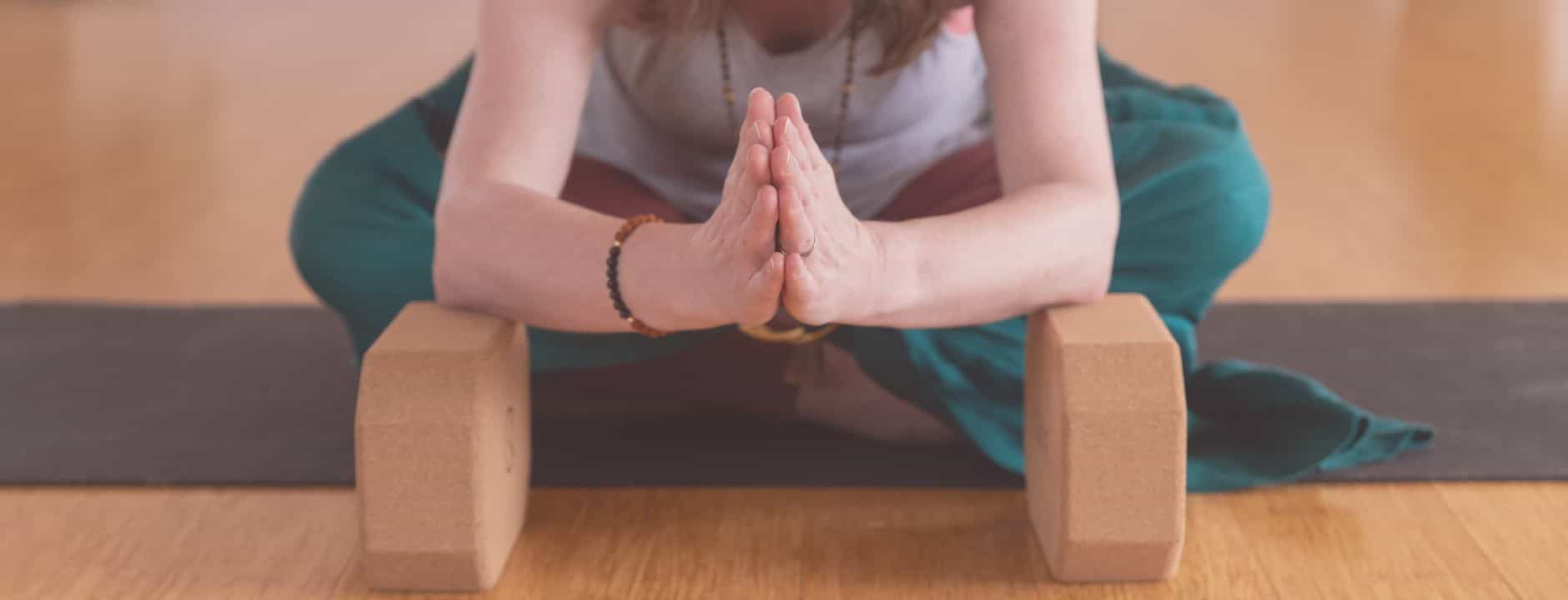 Woman with best eco-friendly yoga props Australia