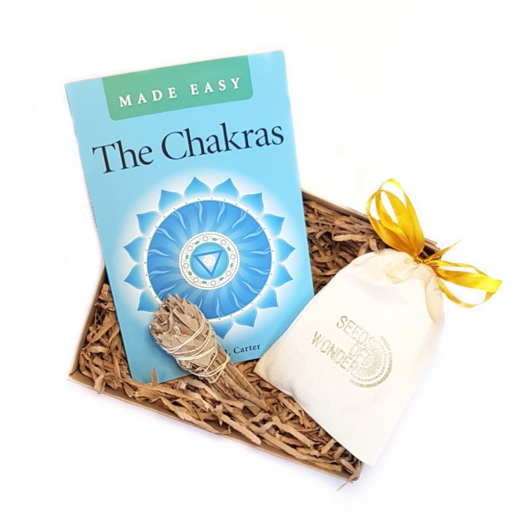The Chakra Made Easy book, Seeds of Wonder's jewellery pouch and sustainable white sage smudge stick in Kraft gift box filled with shredded Kraft paper