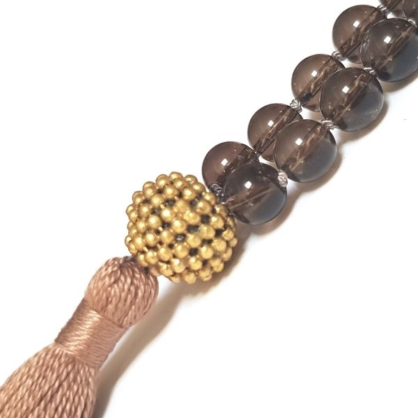 Clsoe up of guru bead on HandmadeRoot Chakra Mala Necklace – Smokey Quartz for Grounding & Stability