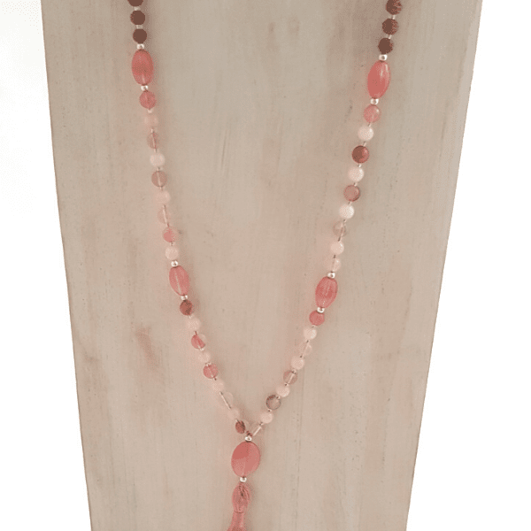 Close up on Handmade Harmony Mala Necklace – Tourmalinated Quartz, Morganite, Rudrakshal on jewellery bust