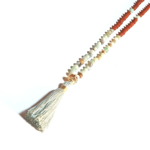Close up of handmade Arogitā Mala Necklace – Health, Happiness & Emotional Balance with gold filigree guru bead