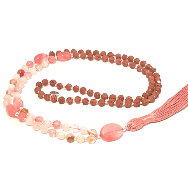 HandmadeHarmony Mala Necklace – Tourmalinated Quartz, Morganite, Rudraksha curled on table