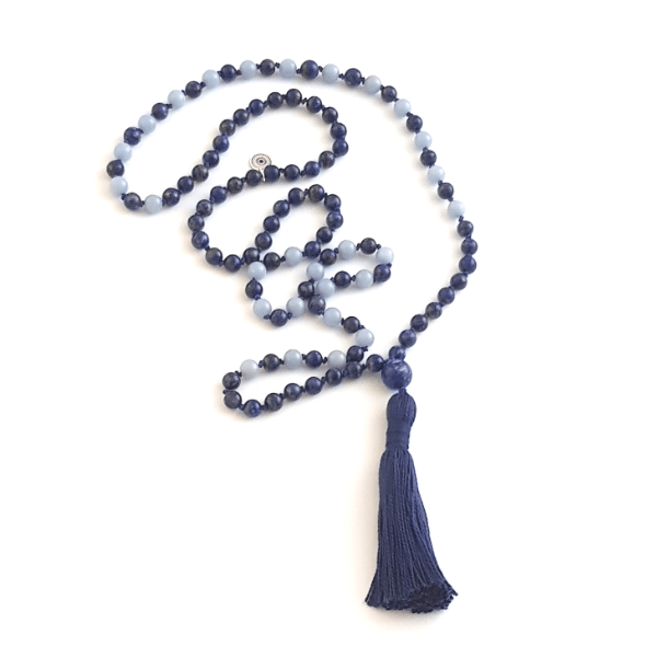 Handmade Lapis Lazuli and Angelite Third Eye Mala Necklace  laid loosely on table