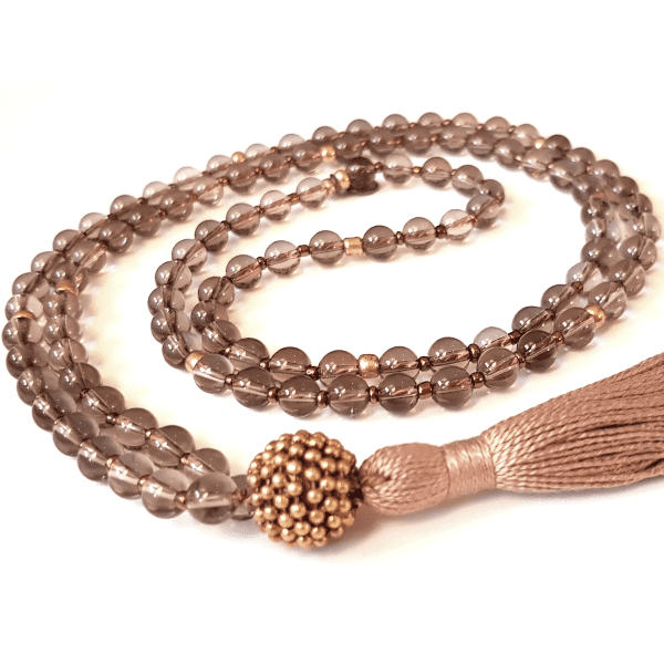 Handmade Nurturing Mala Necklace – Smokey Quartz for Grounding & Balance curled on table