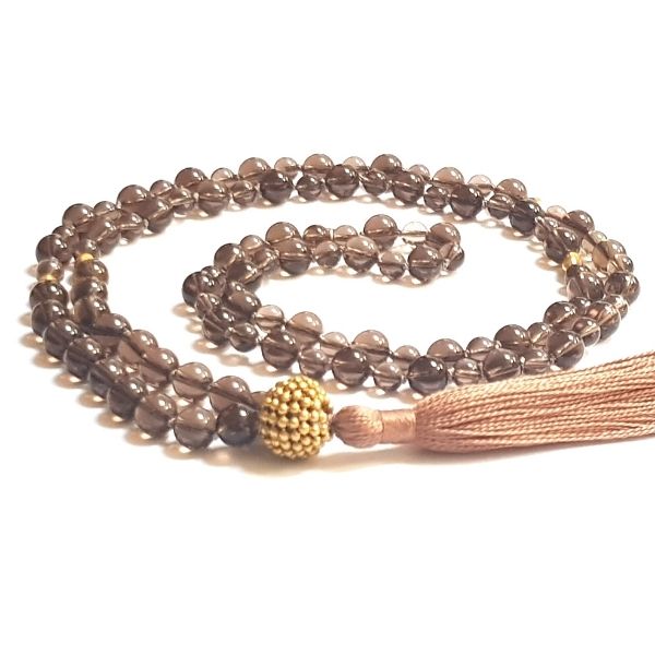 HandmadeRoot Chakra Mala Necklace – Smokey Quartz for Grounding & Stability curled on table