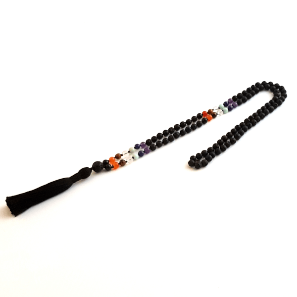 Handmade Chakra Balancing Mala Necklace – 7 Chakra Stones & Lava looped on table