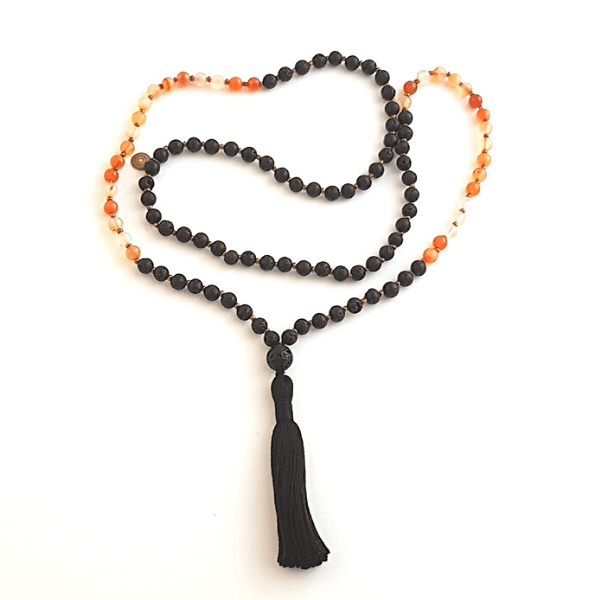 Handmade Creativity Mala Necklace – Carnelian & Lava for Passion & Energy loosely laid out on table