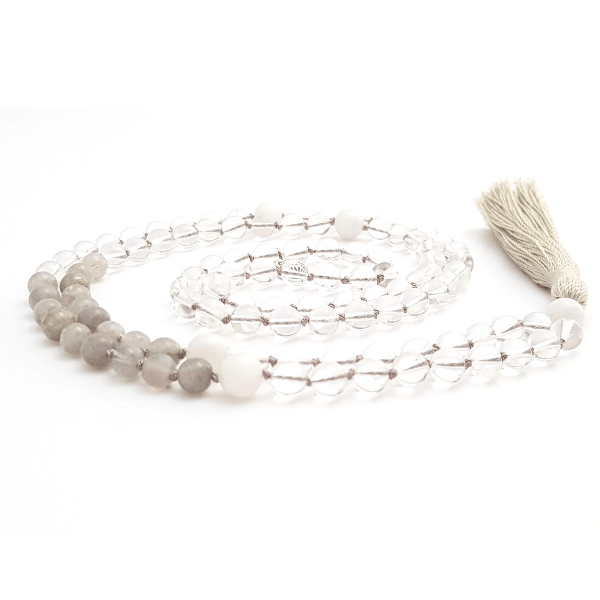 Handmade Crown Chakra Mala Necklace – Labradorite, Moonstone & Quartz curled on table