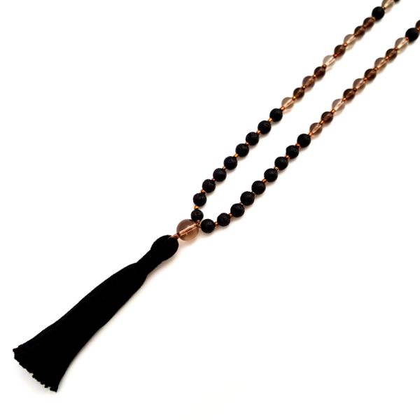 Close up of handmade Earthing Mala Necklace – Smokey Quartz & Lava for Balance tassel