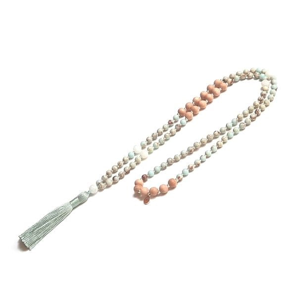 Handmade Focusing Mala Necklace – Rosewood, Moonstone & Jasper looped on table