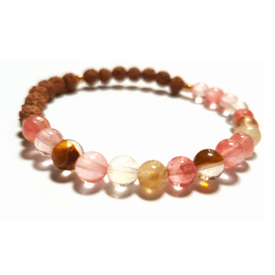 Handmade Harmonising Bracelet – Tourmalinated Quartz & Rudraksha for Peace on white background