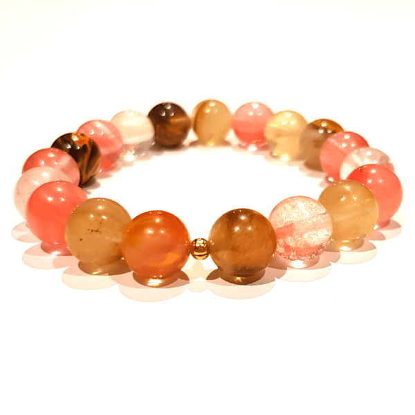 Handmade Light-Hearted Bracelet – Tourmalinated Quartz Bracelet for Positivity on white background