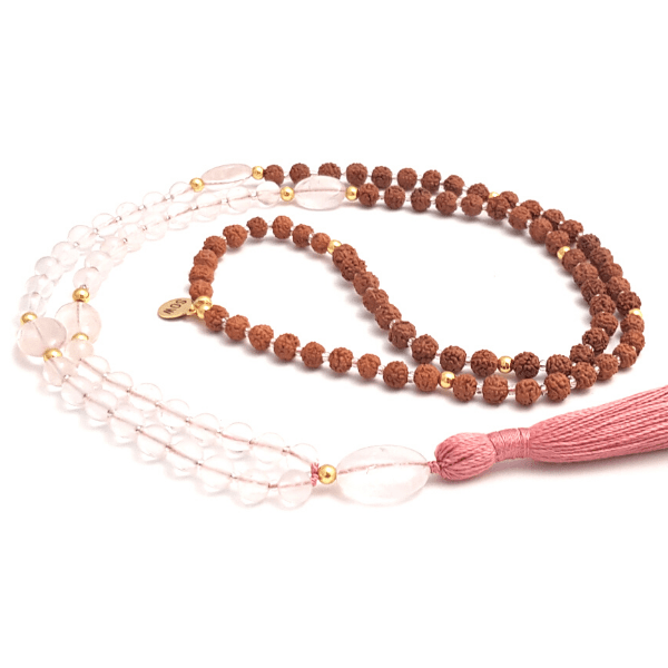 Handmade Rose Quartz Mala Necklace – Love, Healing & Heart Chakra Energy curled on table