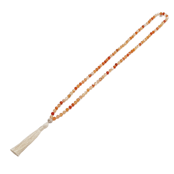 Handmade Sacral Chakra Mala Necklace – Carnelian for Passion & Creativity laid on table