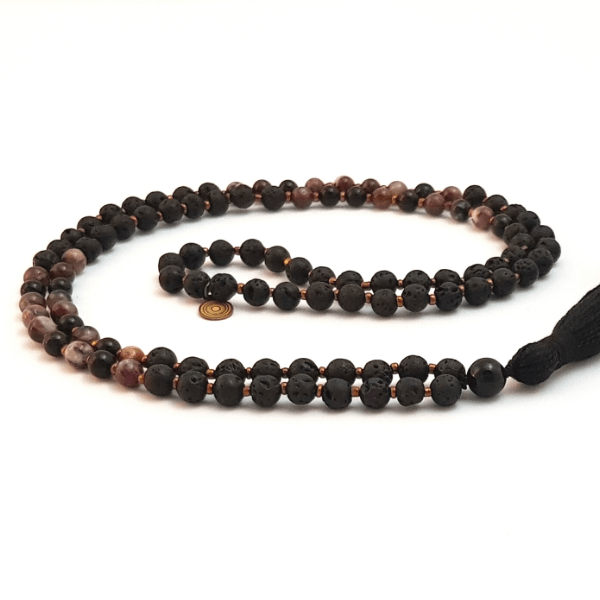 Handmade Self-Acceptance Mala Necklace – Tourmaline & Lava for Confidence curled on table