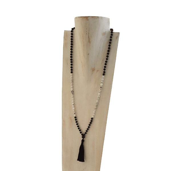 Handmade Serenity Mala Necklace – Howlite & Lava Stone for Calm & Grounding on jewellery bust