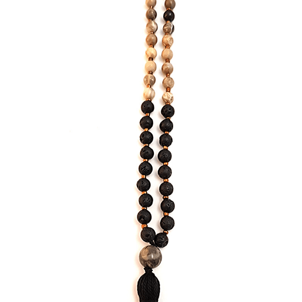 Close up of Handmade Soothing Mala Necklace – Lava & Fossil Coral Stone for Calm beads