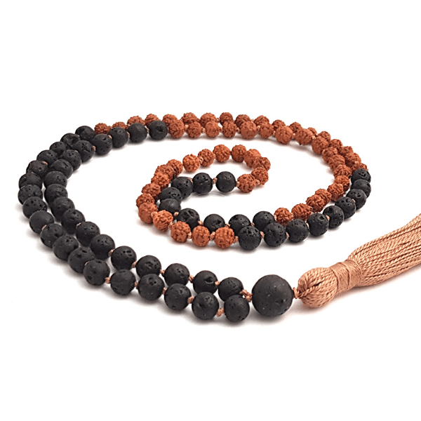 Handmade lava and Rudraksha Grounding Mala necklace curled on table