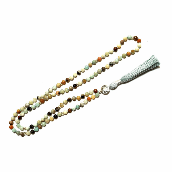 Handmade Amazonite Hope Mala necklace with Lotus guru bead looped on table