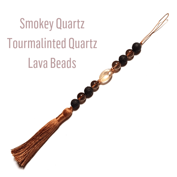 Smokey Quartz, Tourmalinated Quartz and Lava Bead Essential Oil Diffuser on white background