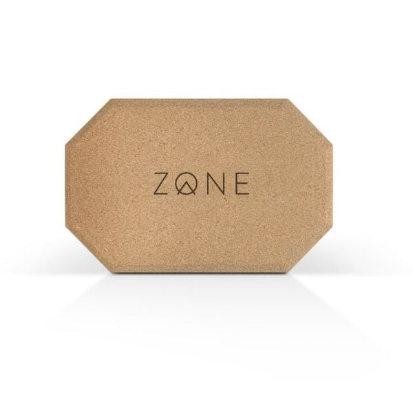 Cork Zone yoga rectangular block with corners cut at an angle resting on long side of block